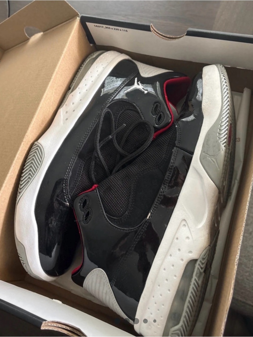 Jordan 11 Nike Black Patent Leather Low-Top Sneakers